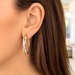 14k Two-Tone Gold Twisted Oval Hoop Earrings 19mm