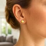 Flat Star Stud Earrings Solid 14k Yellow Gold 6.5 mm on Model