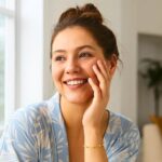 14k Yellow Gold Pebble Bracelet with Textured and Polished Pebble Stations on model wrist