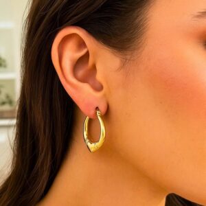 Large Heart Hoop Earrings in 14K Yellow Gold on Model