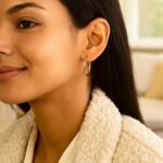 Model Wearing 14k Rose Gold Hoop Earrings 3x25mm Model Wearing 14k Rose Gold Hoop Earrings 3x25mm