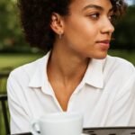 Model Wearing 14k White Gold Thin Small Hoop Earrings 15mm x 2mm