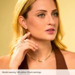 14K Gold Elongated Oval Hoop Earrings on Model