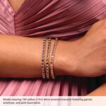 Model Wearing 14k Yellow Gold Emerald Cut Amethyst Line Bracelet Model Wearing 14k Yellow Gold Emerald Cut Amethyst Line Bracelet