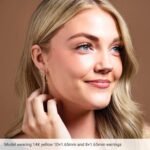 Model Wearing 14k Yellow Gold Small Plain Hoop Earrings 10mm and 8mm