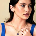 10K Gold Blue Turkish Eye Pendant Necklace on Model 10K Gold Blue Turkish Eye Pendant Necklace on Model