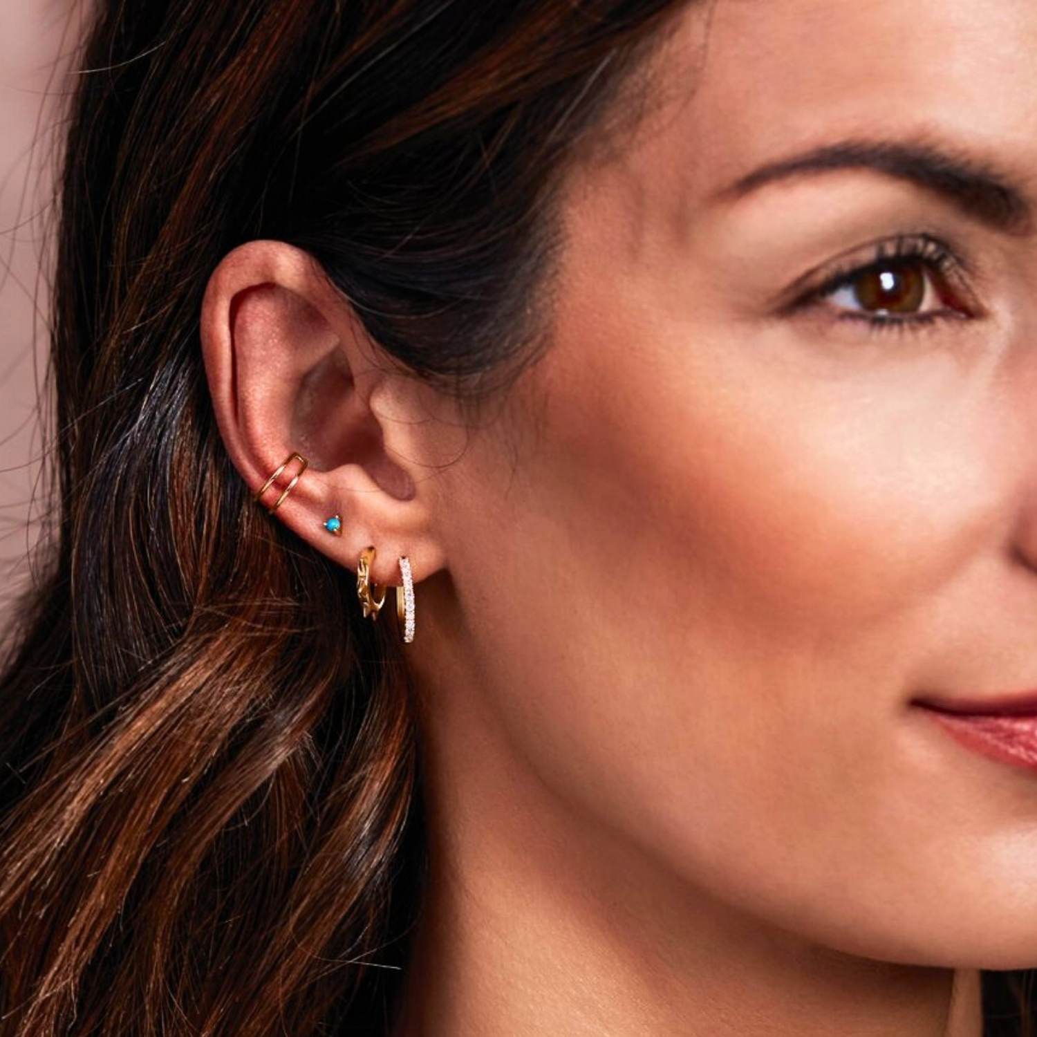 925 Sterling Silver Small Spiked Hoop Earrings on Model 925 Sterling Silver Small Spiked Hoop Earrings on Model