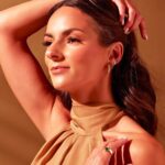 Model Wearing 14K Gold 20mm Scale Hoop Earrings Model Wearing 14K Gold 20mm Scale Hoop Earrings