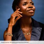 Model Wearing 6 mm 14K Yellow Gold Filled Elastic Bead Bracelet